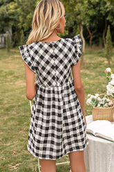 Robe à carreaux et manches papillon à décolleté en V